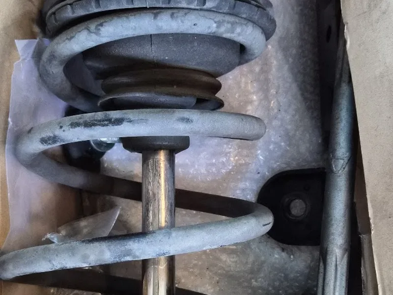 New strut and coil spring assembly ready to install