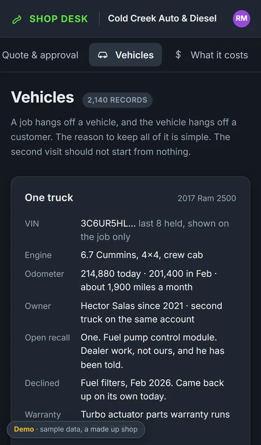 A vehicle record on a phone, showing the car, its history with the shop and the lookups available for it