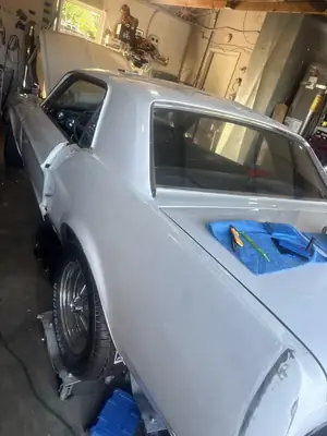 Fresh Oxford White wrap on the Mustang quarter panel