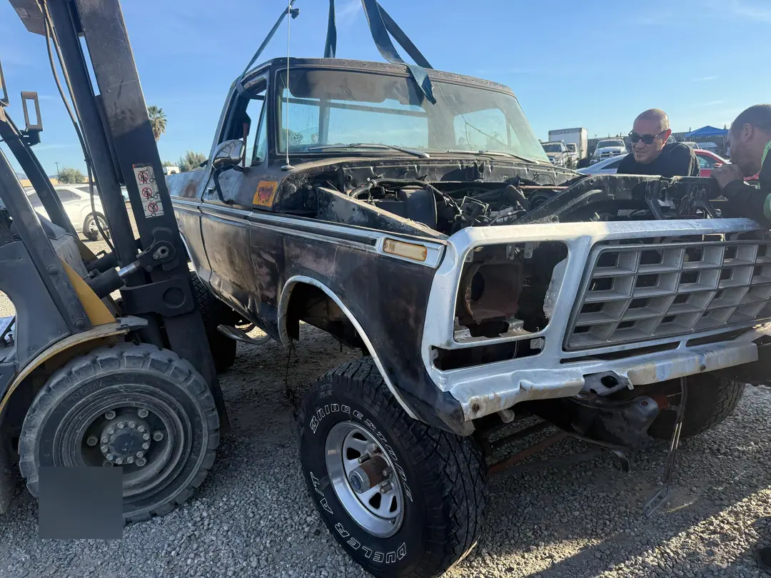 The 1970s Ford pickup on a forklift with the engine back in, December 2025