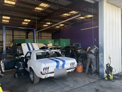 Finished Mustang in the Supercanic bays with the crew