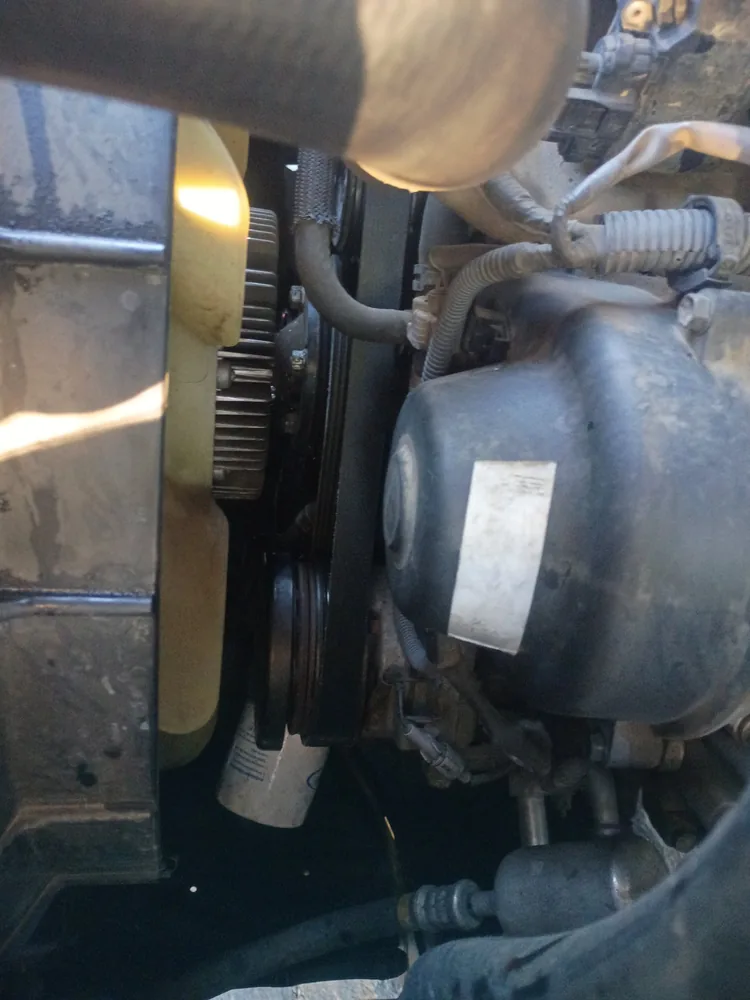 The front of the Sequoia's 4.7 liter V8 with the serpentine belt running over the pulleys behind the fan