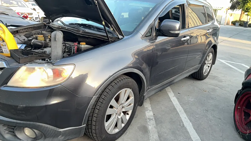 Subaru Tribeca with headlights on during an on-site diagnostic in Beaumont CA