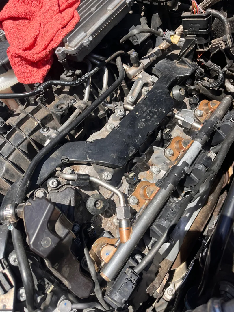 Engine opened up for fuel injector work on a Corona CA vehicle