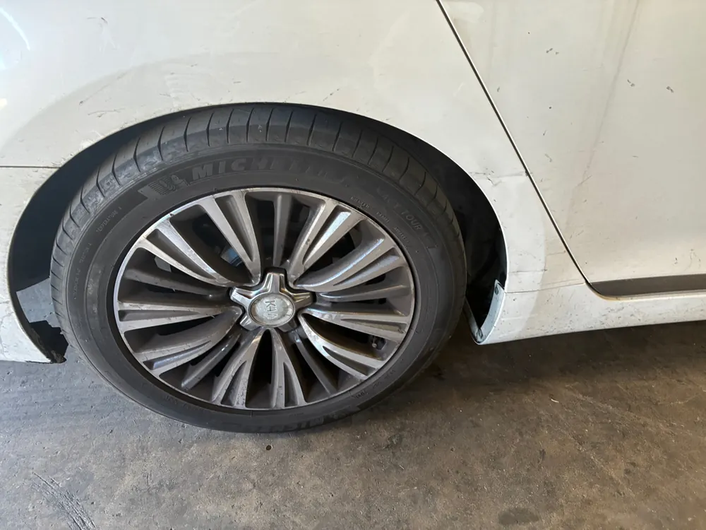 Tire and fender check on a Kia K900 from Corona CA