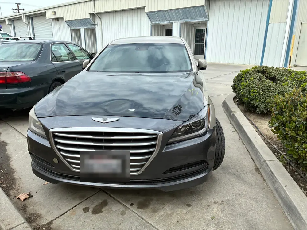 Two-tone Hyundai Genesis in for diagnosis at the Lake Havasu location