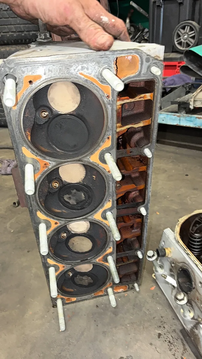 Cylinder head removed from the engine and set up for inspection
