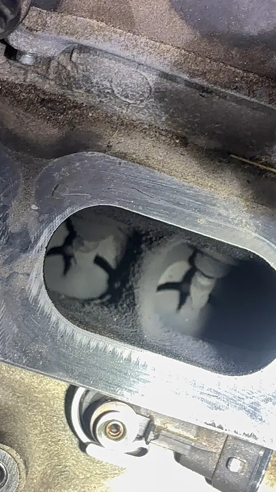 Intake port detail during Ford Explorer timing service in Jurupa Valley CA