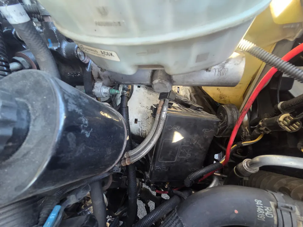Engine bay inspection on a Chevy Express 3500 work van in Gardena CA