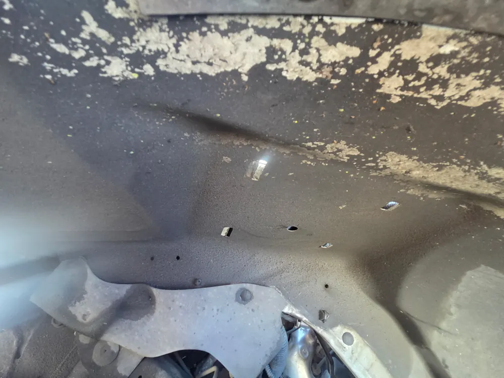 Inner fender inspection on a Chevy Express 3500 van