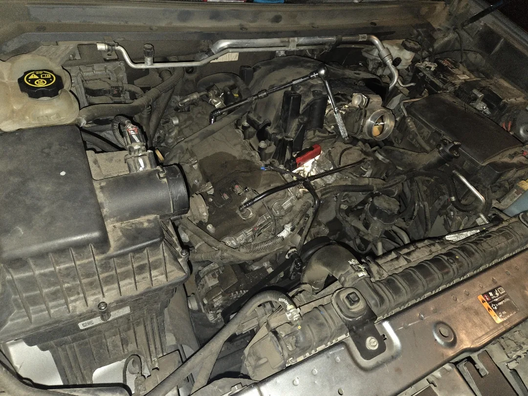 Engine bay opened for a coolant temperature sensor in Moreno Valley CA
