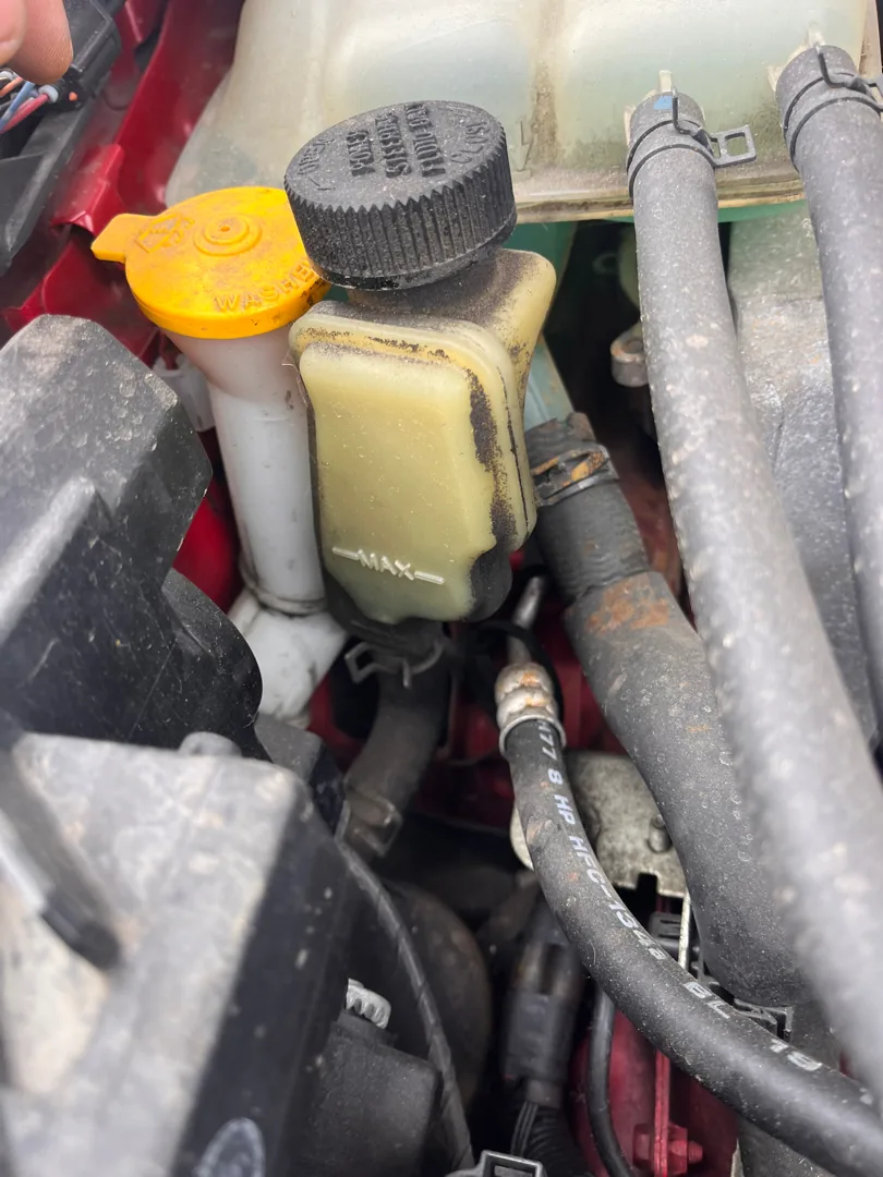 Coolant and brake reservoirs checked on a Riverside CA inspection