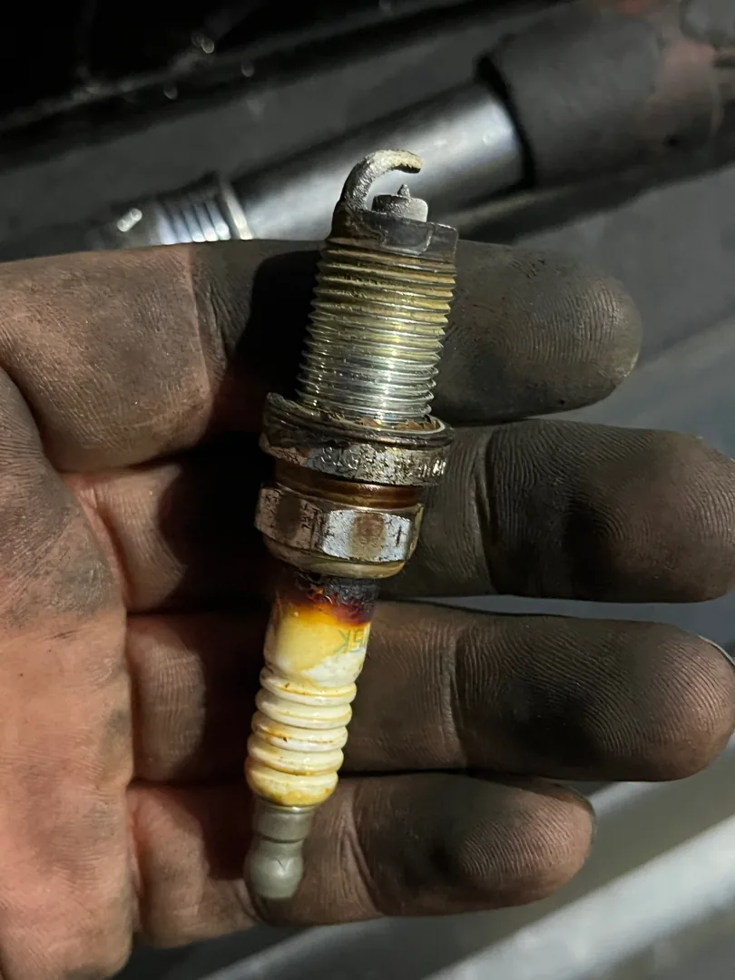 Badly worn spark plug pulled during a Riverside CA diagnostic