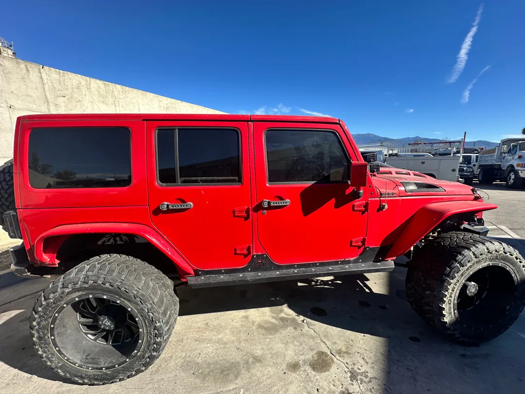 Lifted Jeep Wrangler on oversize tires at the Supercanic shop in San Jacinto CA