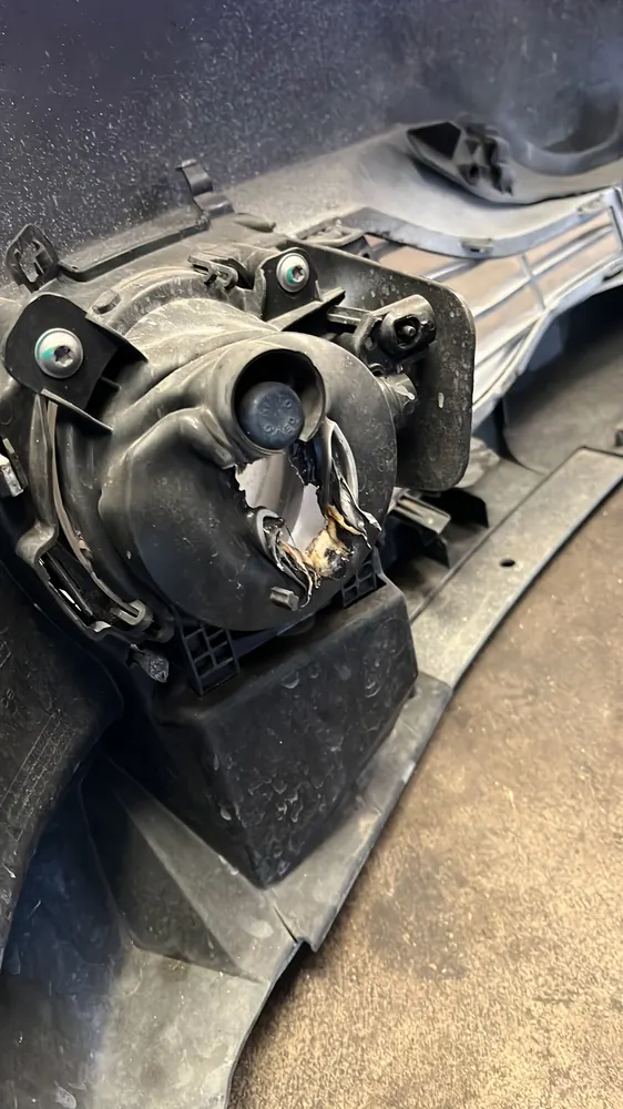 Headlight assembly out during a BMW 328i engine swap for a Temecula CA customer