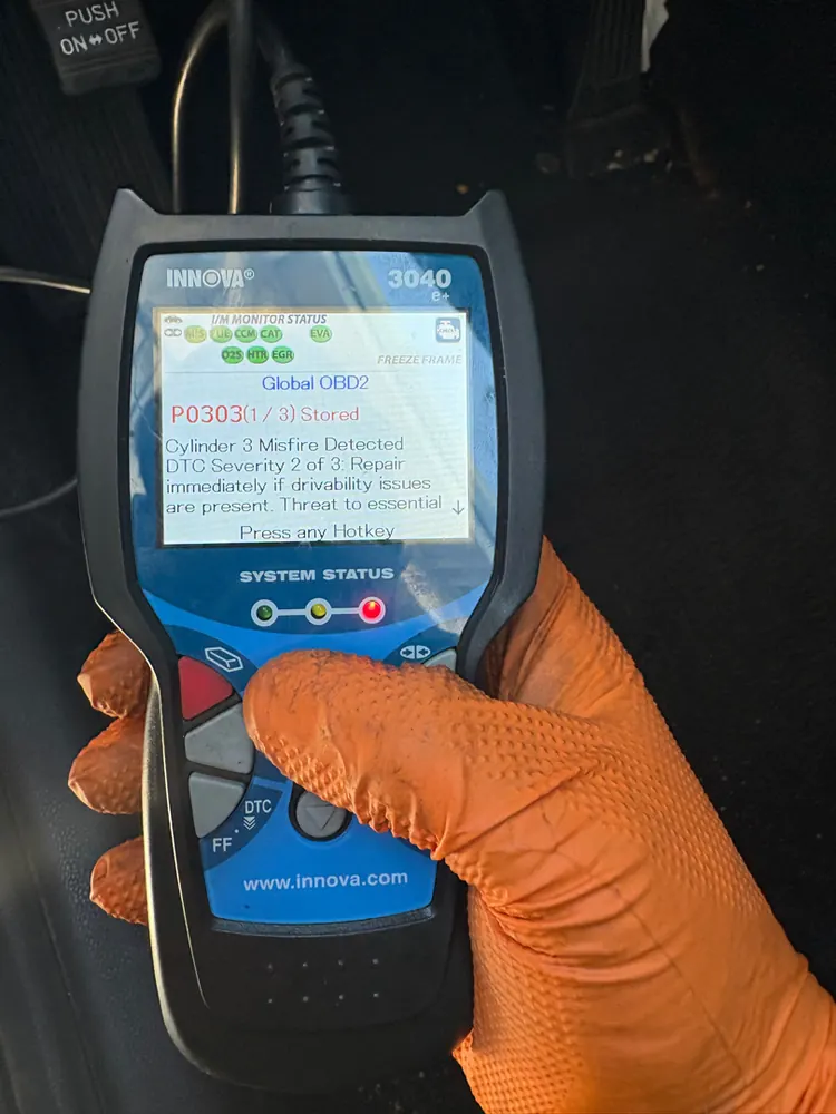 Scan tool showing P0303 cylinder 3 misfire during a mobile spark plug call in Hemet CA