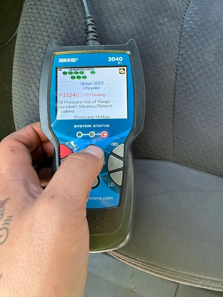 Scan tool showing code P1524 oil pressure out of range for camshaft advance