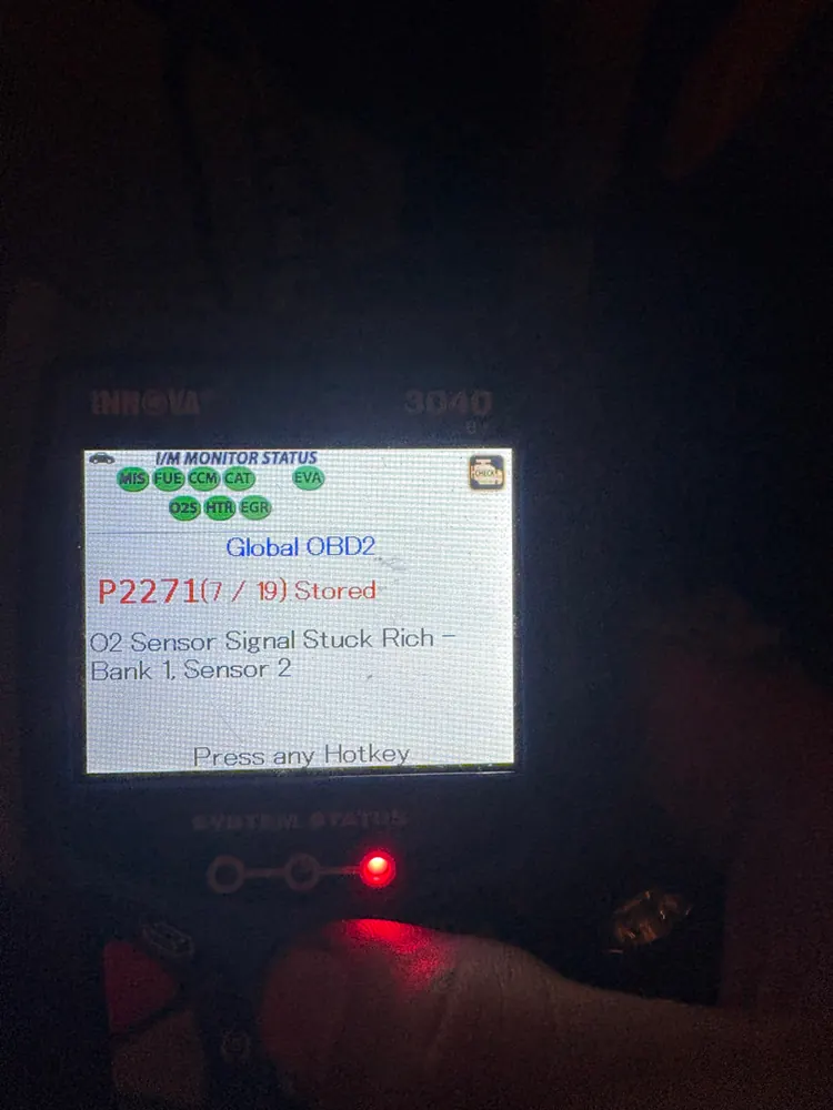 Scan tool showing code P2271 oxygen sensor signal stuck rich Bank 1 Sensor 2