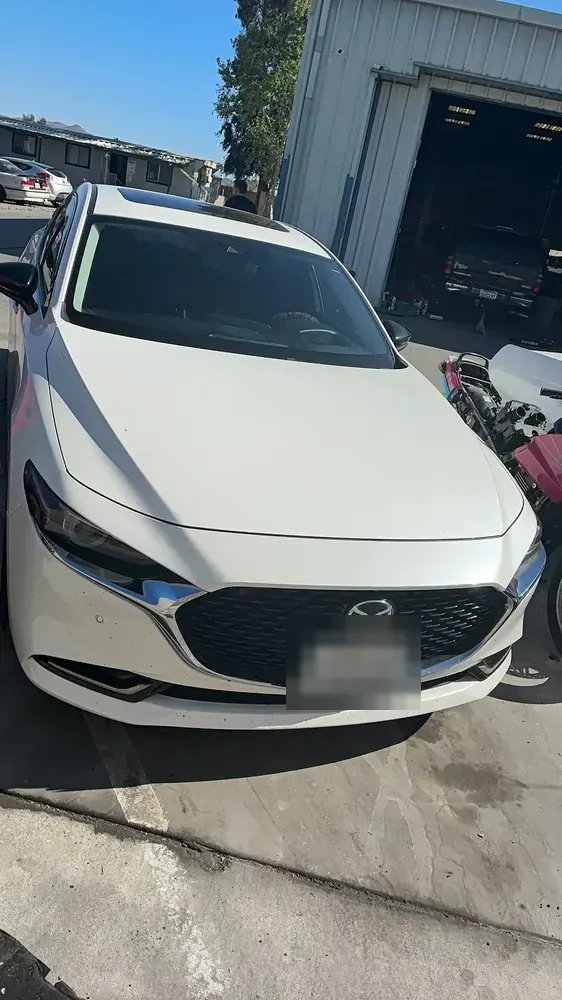 2021 Mazda 3 at the shop for front and rear brake pad replacement