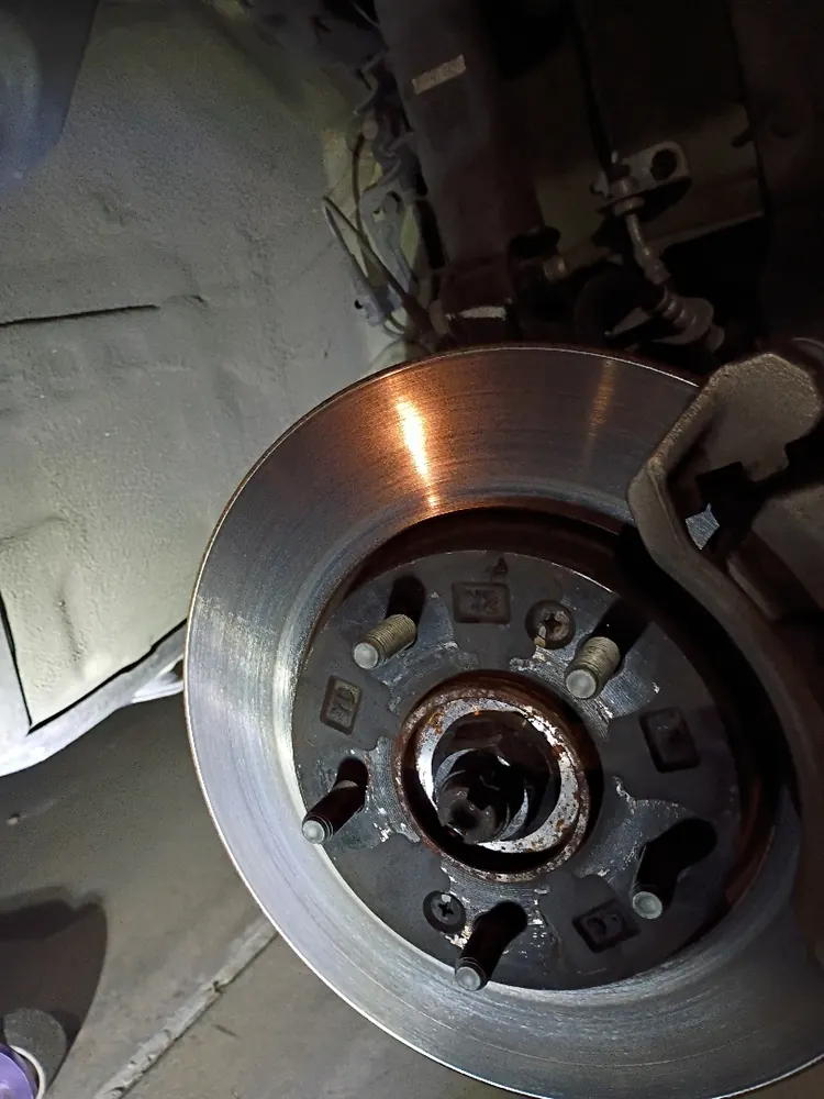 Brake rotor and caliper during a brake inspection on a Kia Soul in San Jacinto CA