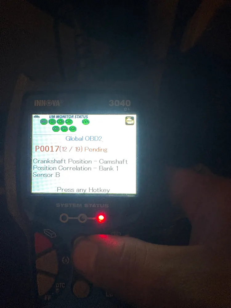 Scan tool showing a P0017 crank-cam correlation code during diagnosis