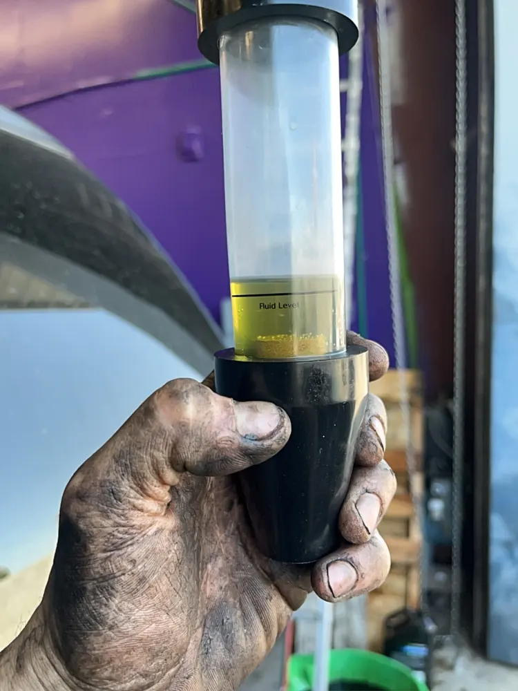 Engine oil sample drawn to check condition during service