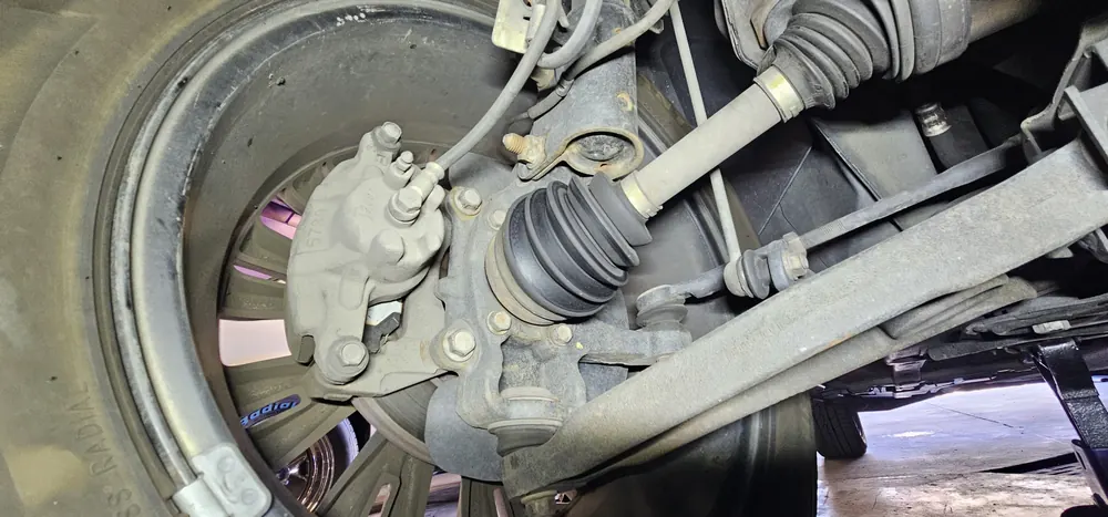 CV axle and rear knuckle during suspension diagnosis on a Chrysler 200