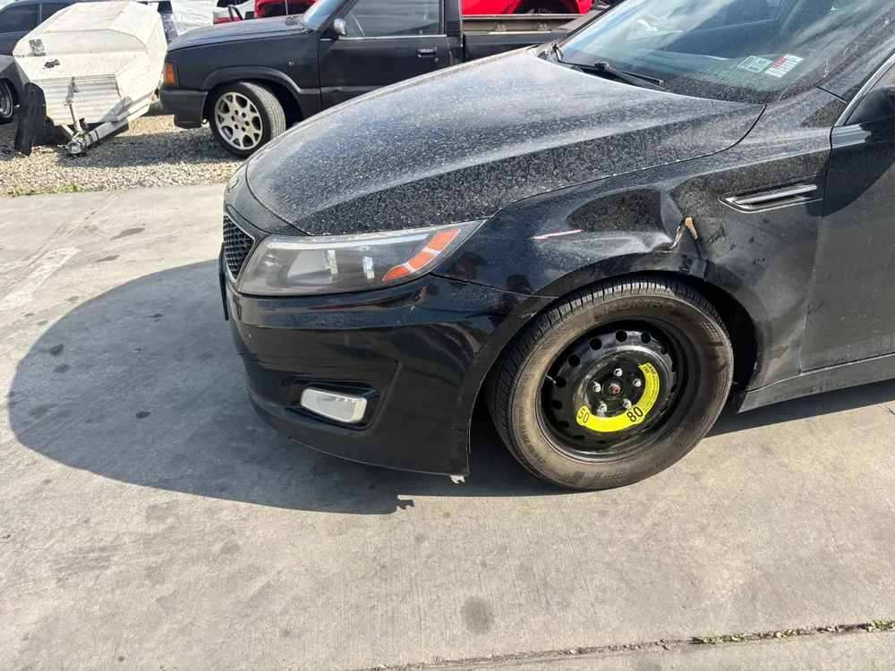 Kia Optima in the shop for front suspension and wheel bearing work