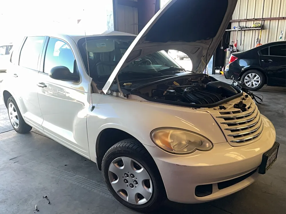 PT Cruiser in the Supercanic shop for timing and motor mount work