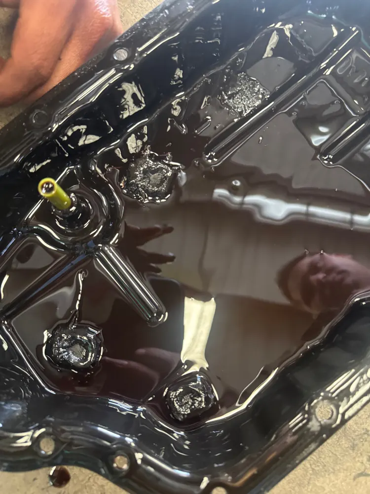 Transmission pan with fresh fluid during a transmission swap on a Toyota RAV4 in Hemet CA
